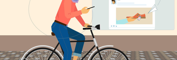 guy riding his bike looking at twitter and manage flittler